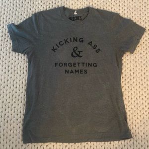 “Kicking ass and forgetting names” tee